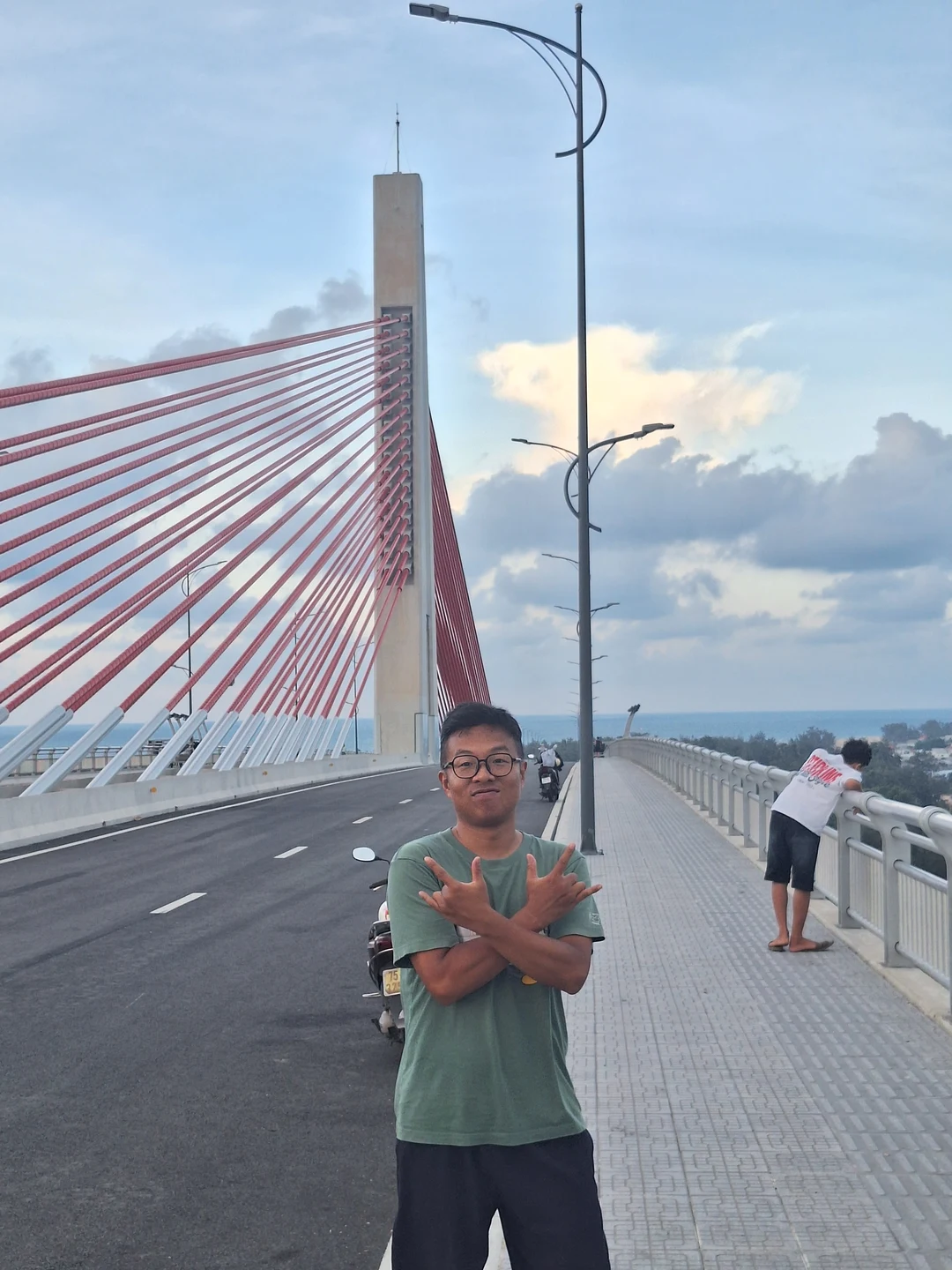Newly Built Thuan An Bridge · Broad panoramic vistas and vibrant red cable-stayed towers