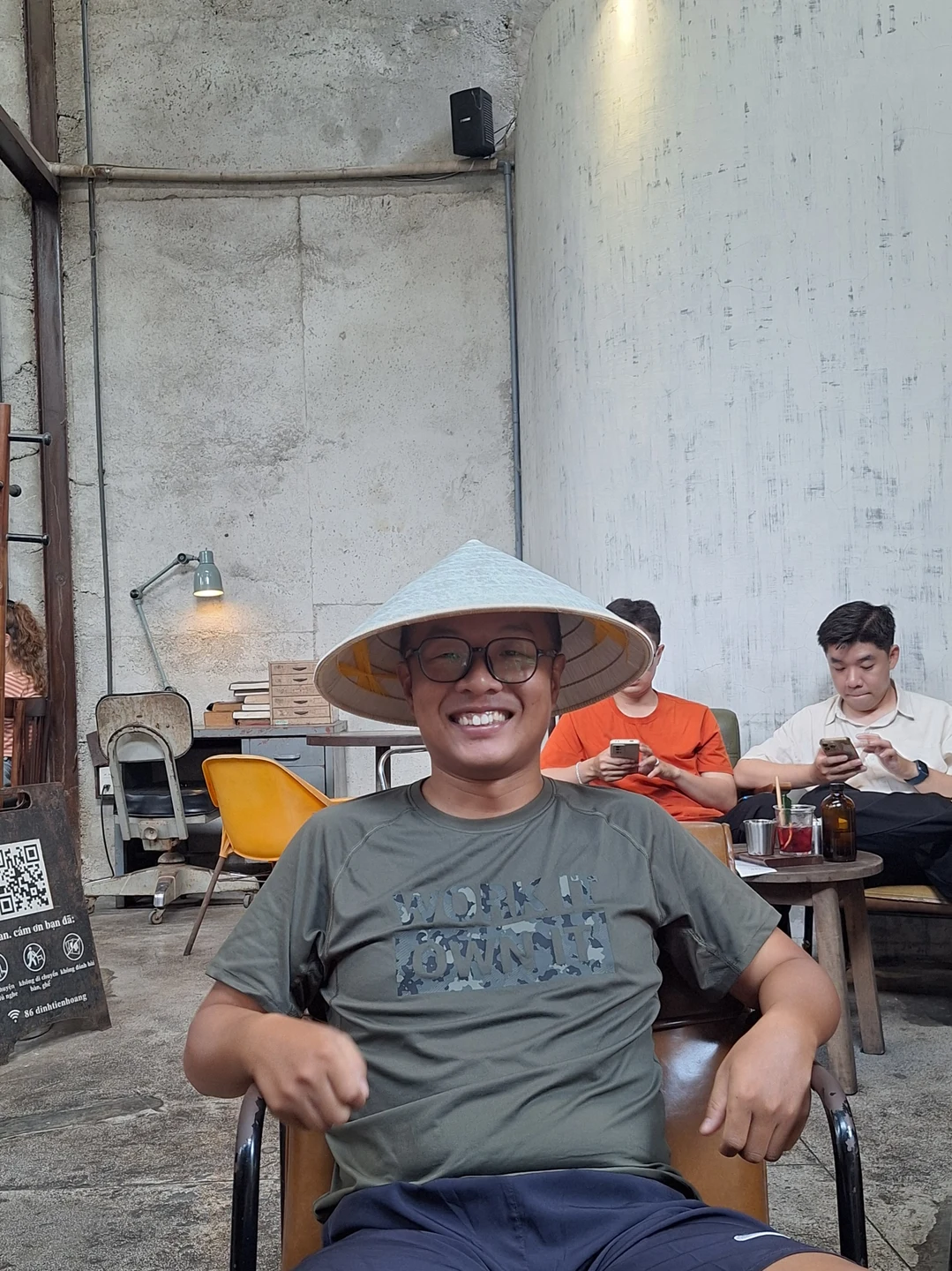 Unveiling a Hidden Alleyway Café · Donning a traditional Vietnamese conical hat to savor slow-drip coffee